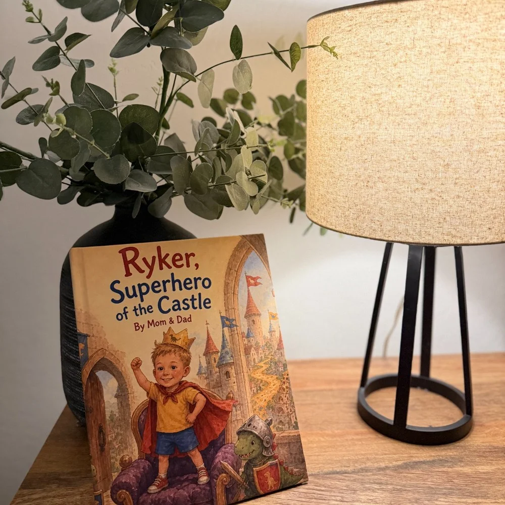 Ryker, Superhero of the Castle standing on a side table, showing the printed hardcover and spine